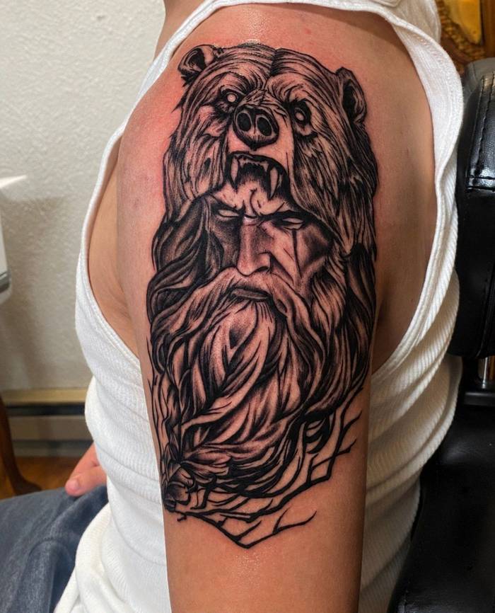 Fresh Norse warrior with bear headdress blackwork shoulder tattoo by Shawn Lowe at Fargo Tattoo in Fargo ND in Fargo, North Dakota